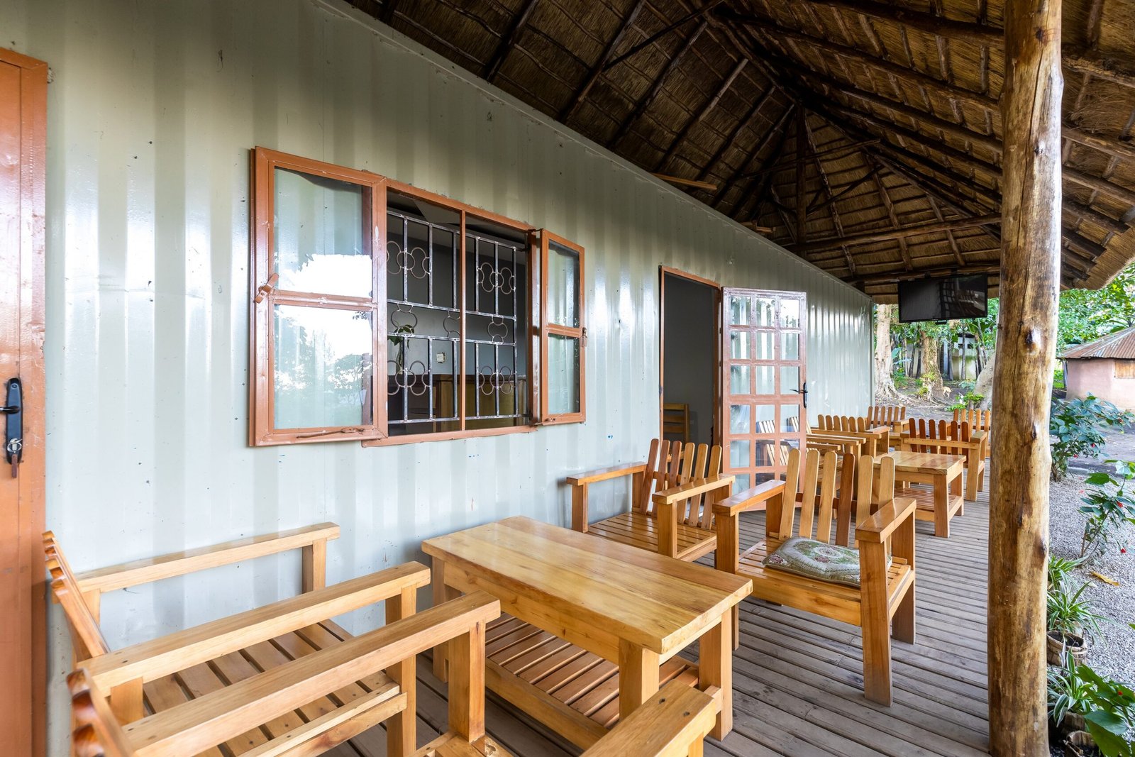 Lakeside bar veranda ready for sunset drinks at Bahundu near Kibale Forest in western Uganda