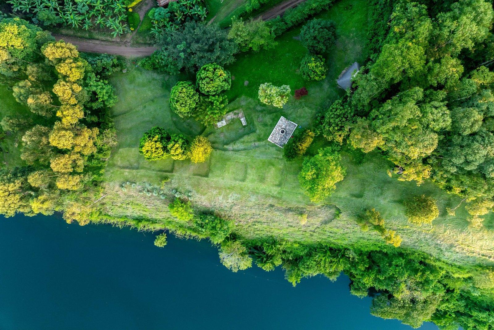 Private campsite with open lawns, lake views and space for a night fire at Bahundu near Fort Portal, Uganda