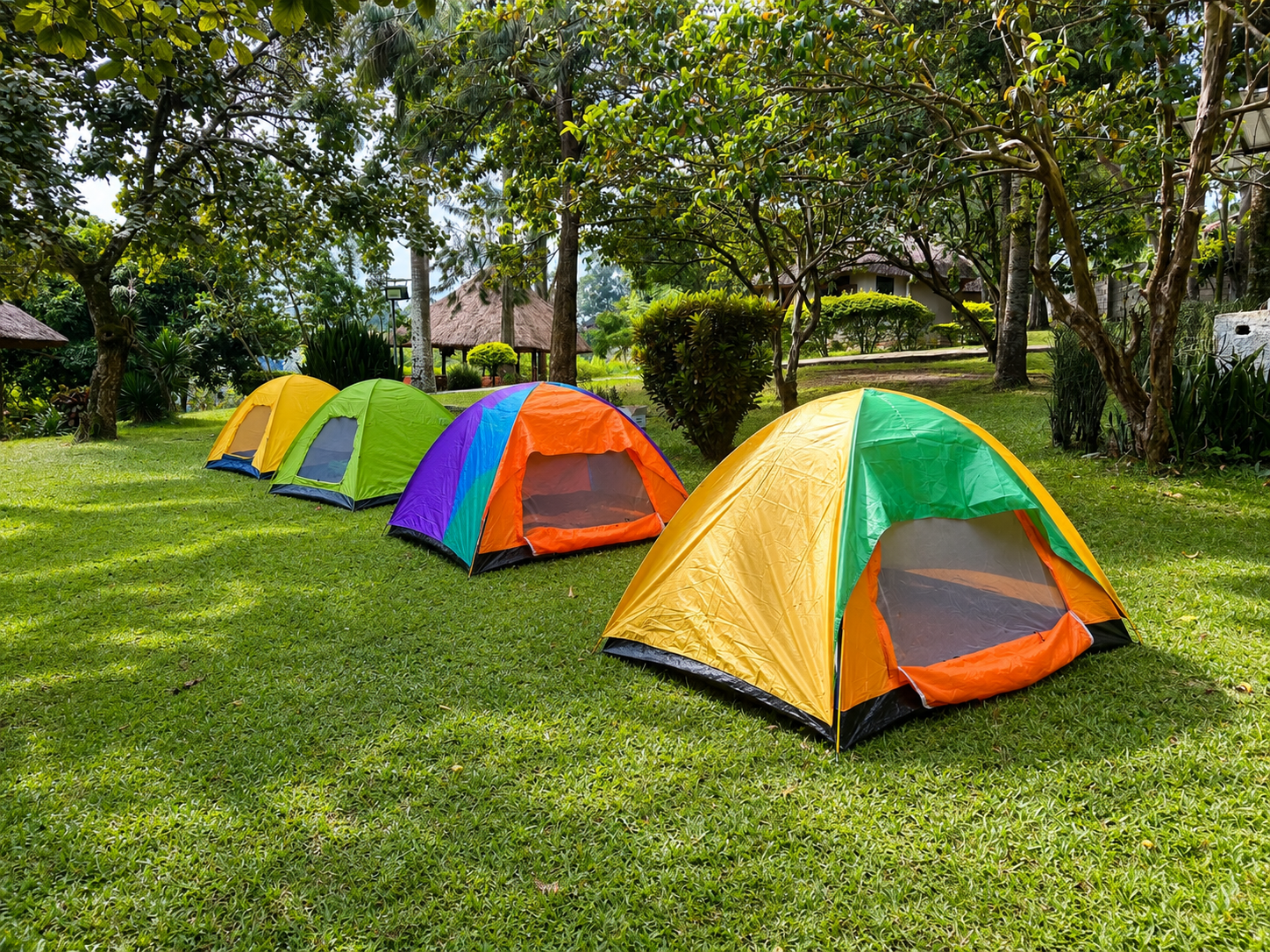 Private camping grounds on the green shore above the crater lake at Bahundu in western Uganda