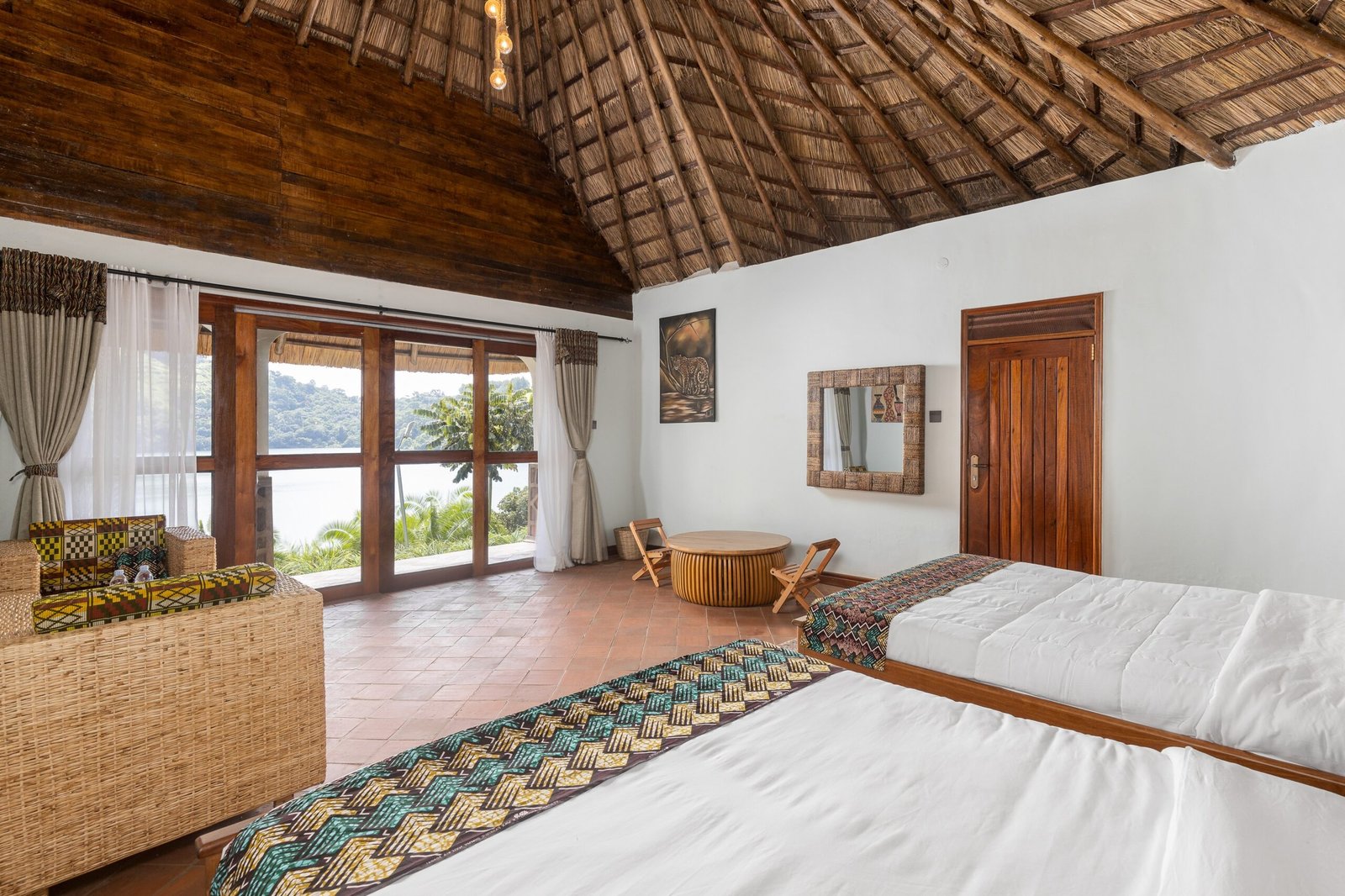 Lake facing bedroom inside the spacious double cottage at Bahundu near Fort Portal