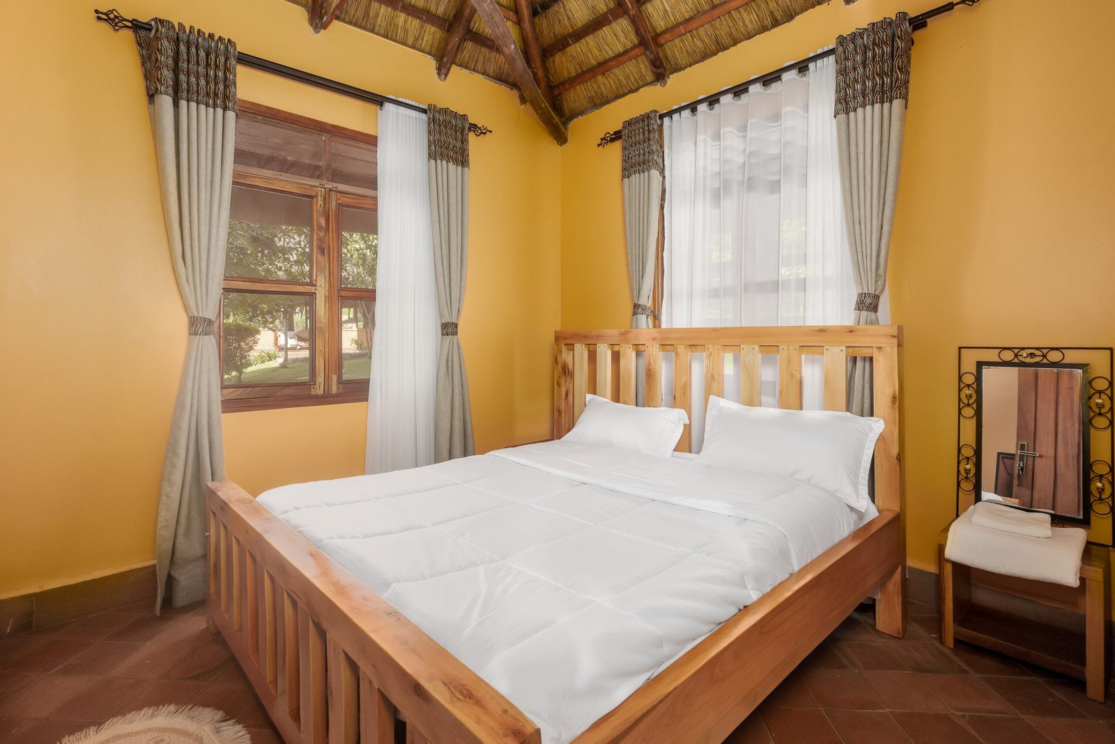 Private bedroom inside the family cottage near Kibale Forest