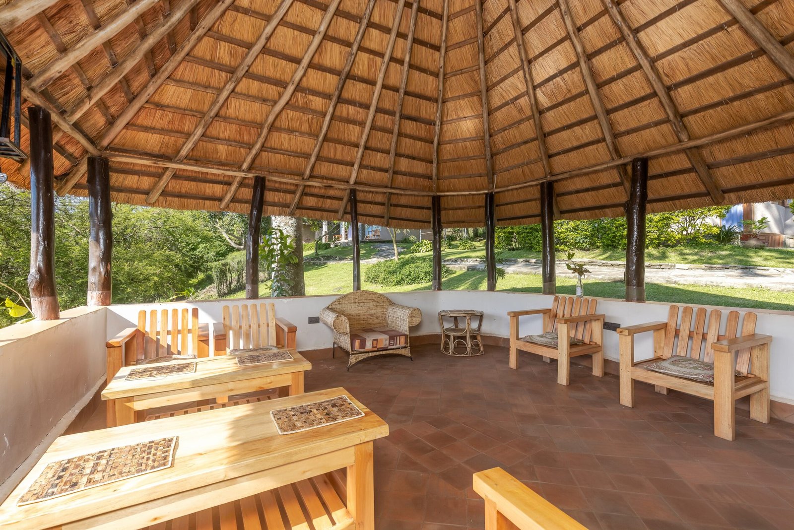 Restaurant tables prepared for a peaceful meal at Bahundu in western Uganda, East Africa